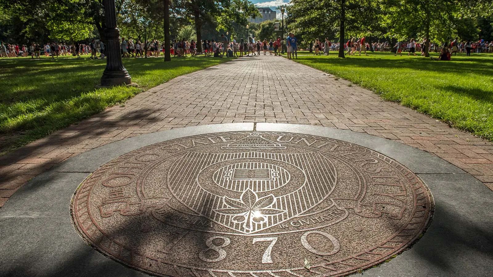 Photograph of university seal on the Oval walkway