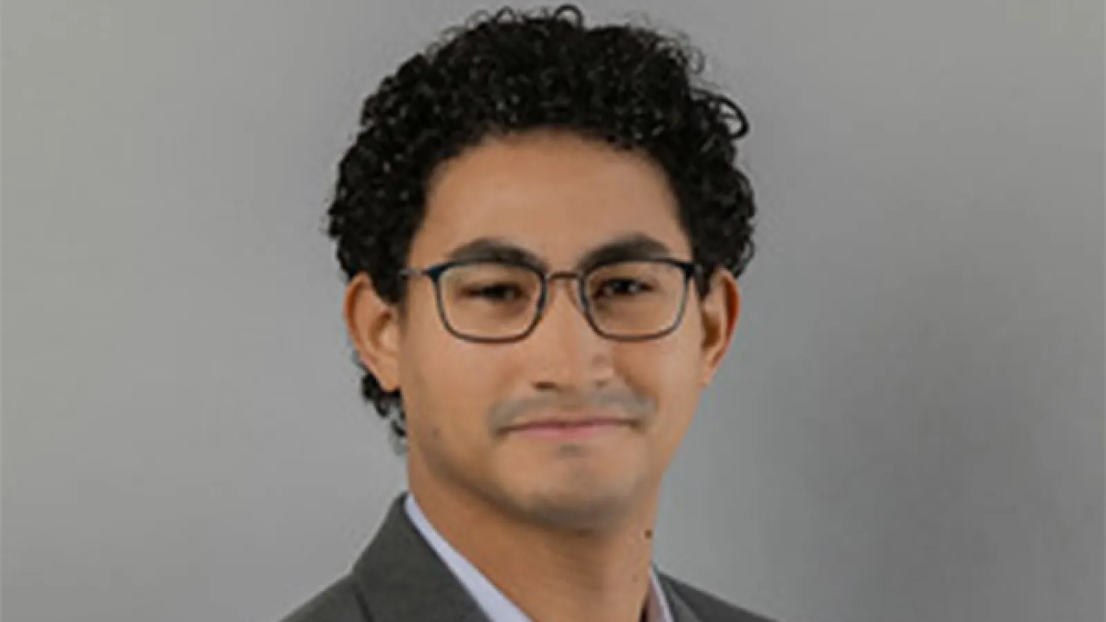 Smiling man with glasses