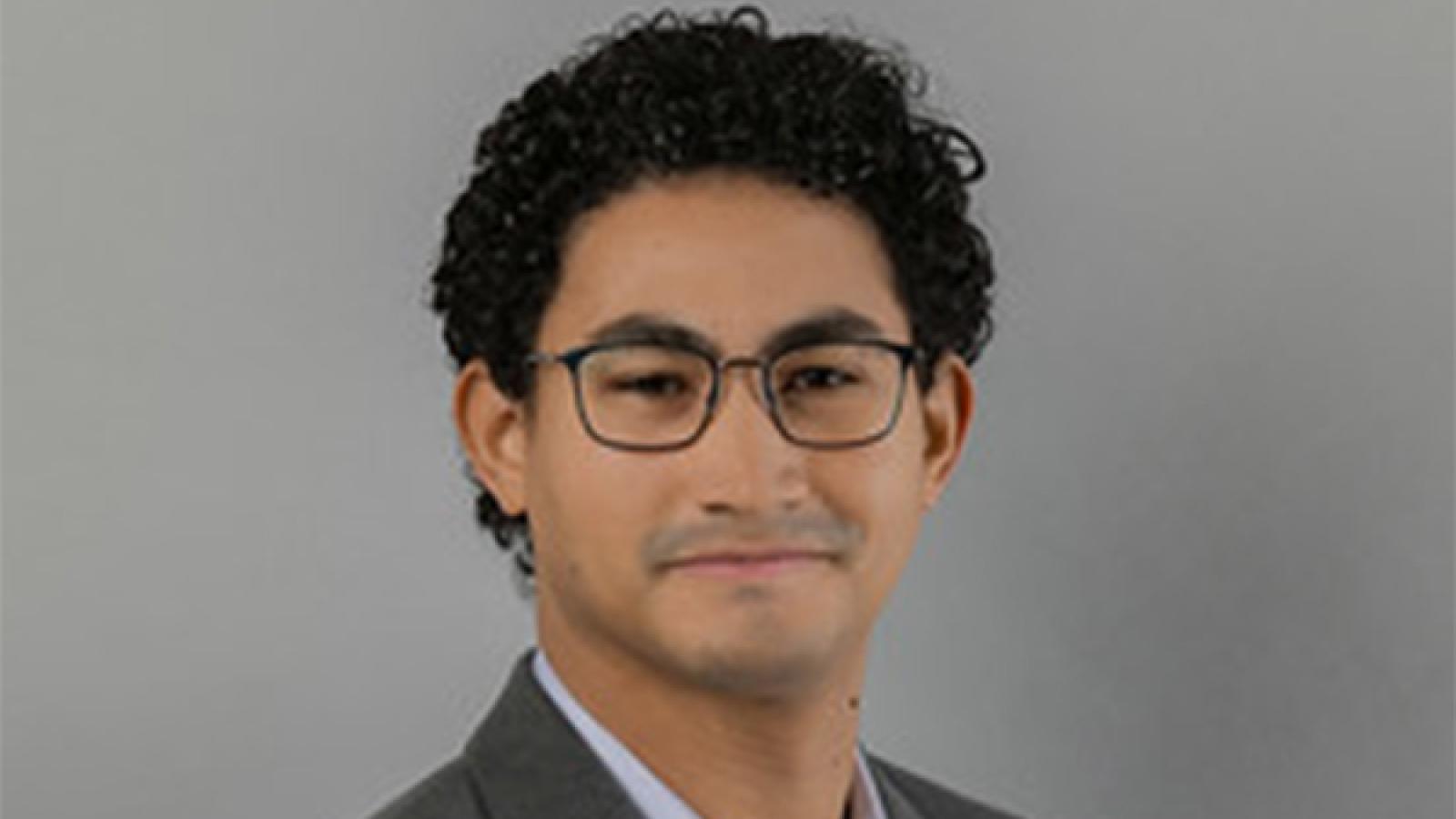 Smiling man with glasses